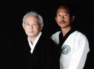 Moo Duk Kwan® Founder Hwang Kee and Moo Duk Kwan® President H.C. Hwang